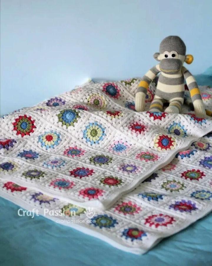 Crochet Sunburst Granny Square Baby Blanket Pattern