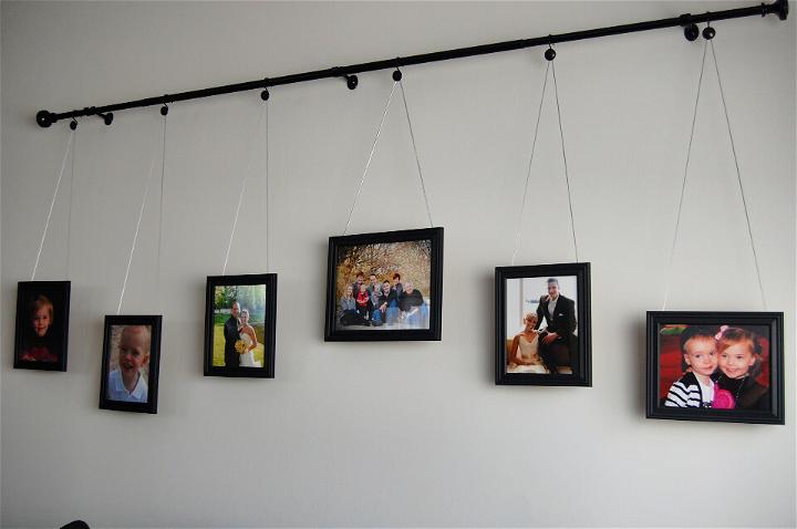 DIY Curtain Rod Gallery Wall