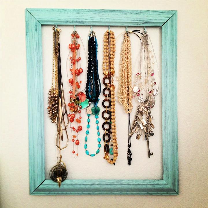 diy necklace holder out of picture frame