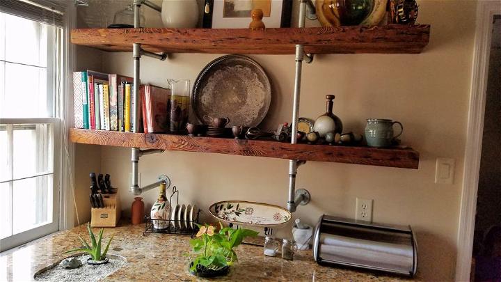 Creative Steel Pipe Shelves With Reclaimed Wood