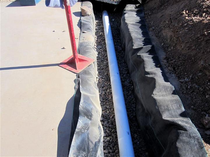 Building a French Drain With Gravel and Rock