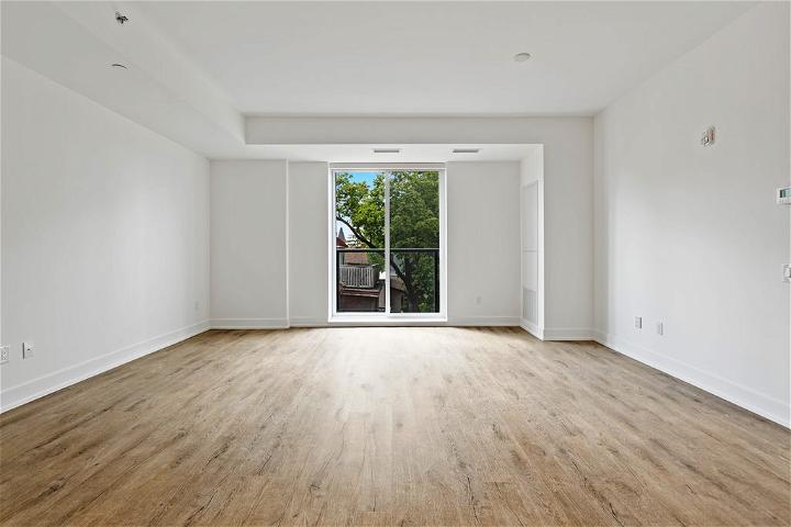 An empty room with white walls during home renovation