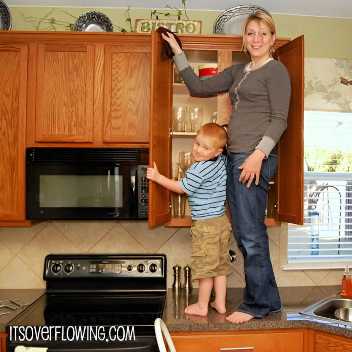 washing and de greasing all the cabinets