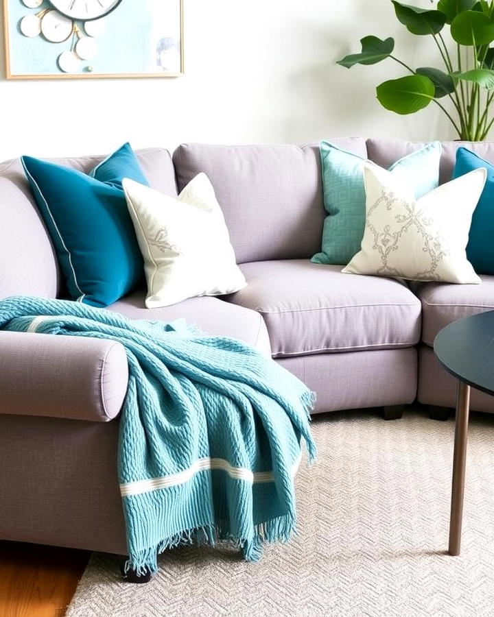 Teal Throw Pillows on a Grey Sectional