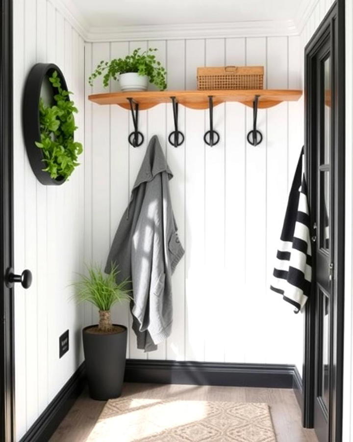 White Shiplap Walls with Black Hooks