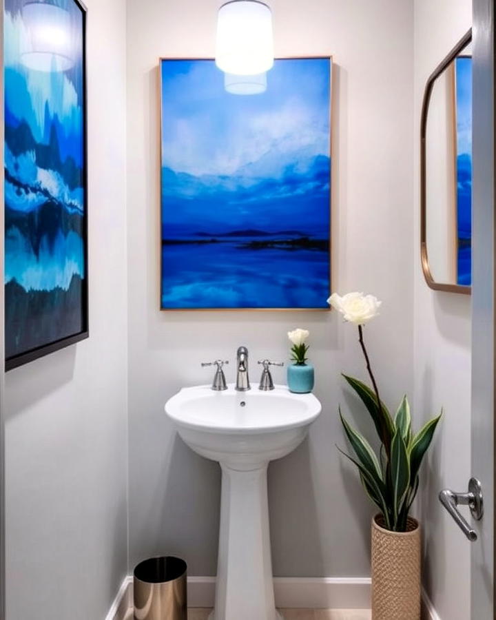 blue artwork display in bathroom