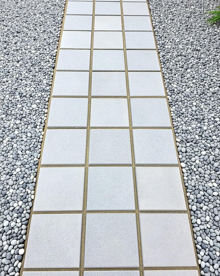 grey pavers walkway with gravel accents