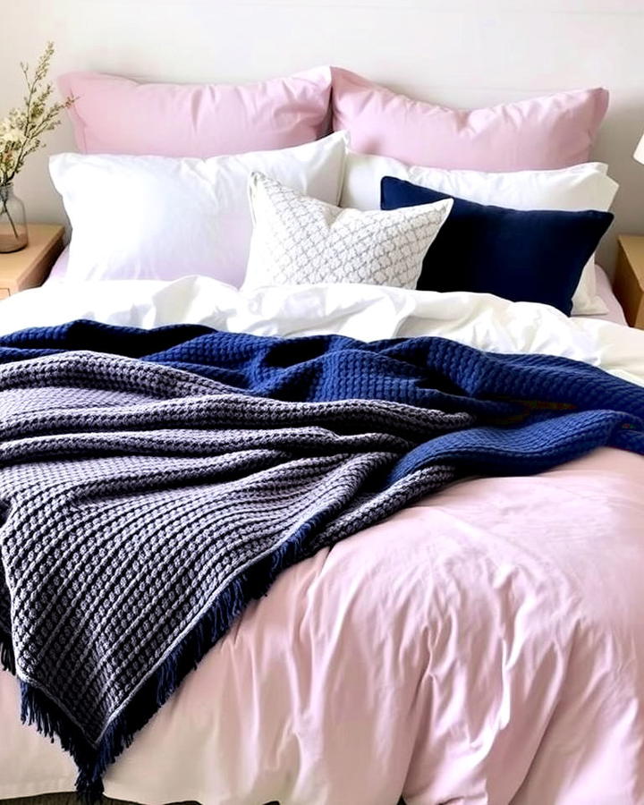 lavender and navy bedding layers