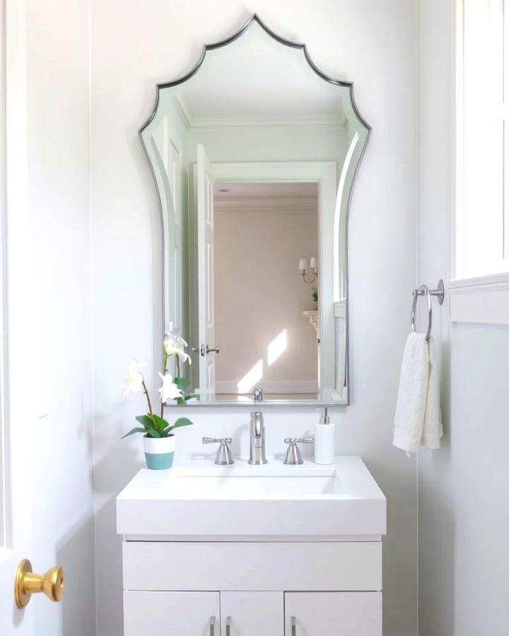 Incorporate a Statement Mirror - 30 Small White Bathroom Ideas