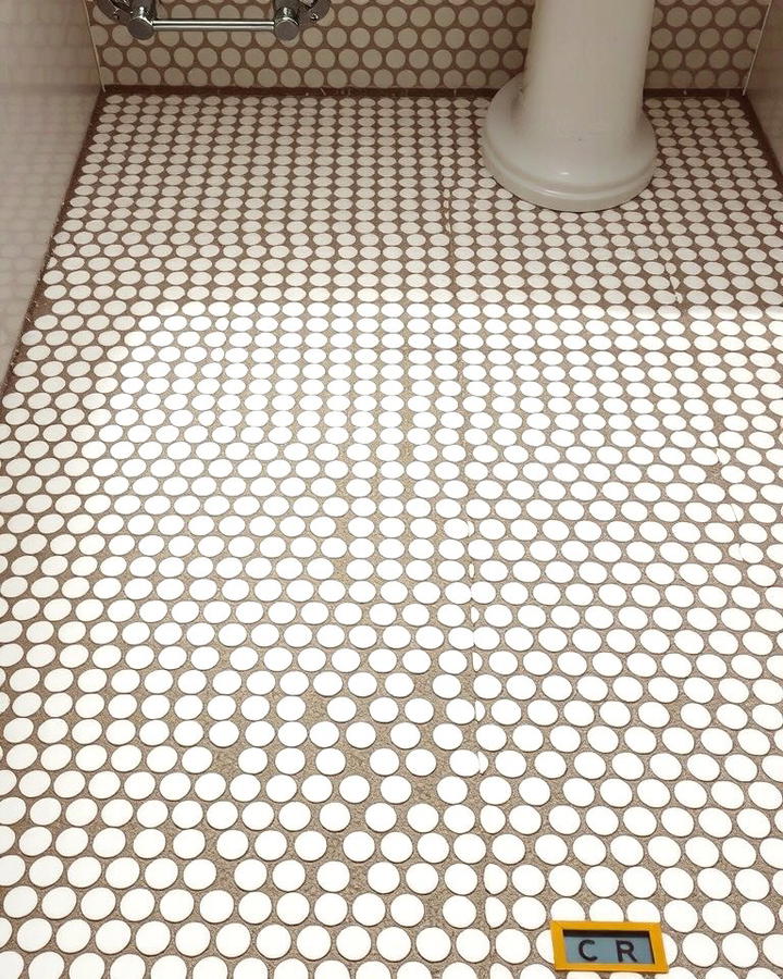 White Penny Tiles for Vintage Charm - 30 White Tile Bathroom Ideas