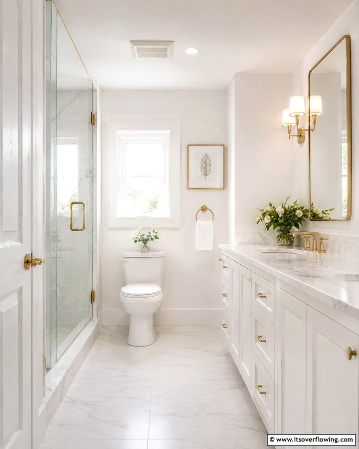 Add Subtle Metallic Accents - 30 Small White Bathroom Ideas to Brighten Compact Spaces