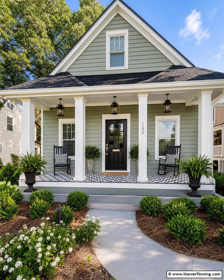 Adding Patterned Tiles to the Porch - 20 Sage Green House With Black Door Design Ideas