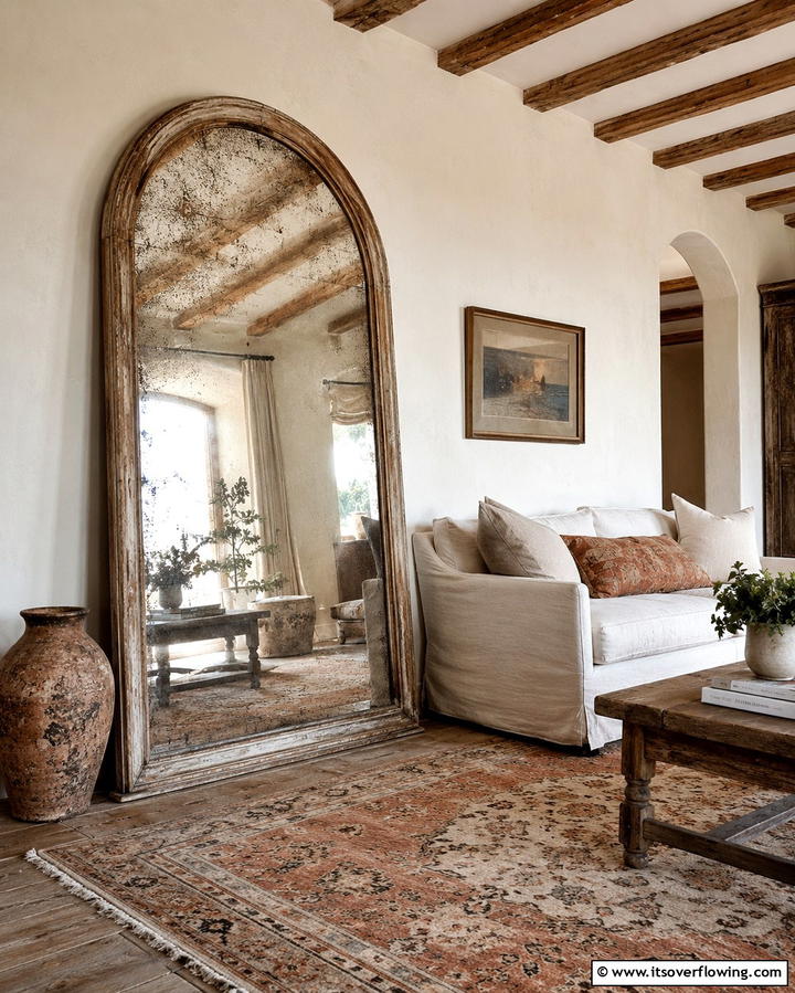 Antique Mirror with Distressed Finish - 25 Living Room Mirror Ideas to Brighten Your Space