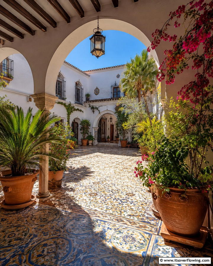 Arched Doorways and Windows - 20 Spanish Courtyard Ideas for a Serene Outdoor Space