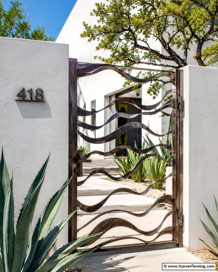 Artistic Abstract Metal Gate - 25 Metal Garden Gate Ideas to Enhance Your Outdoor Space