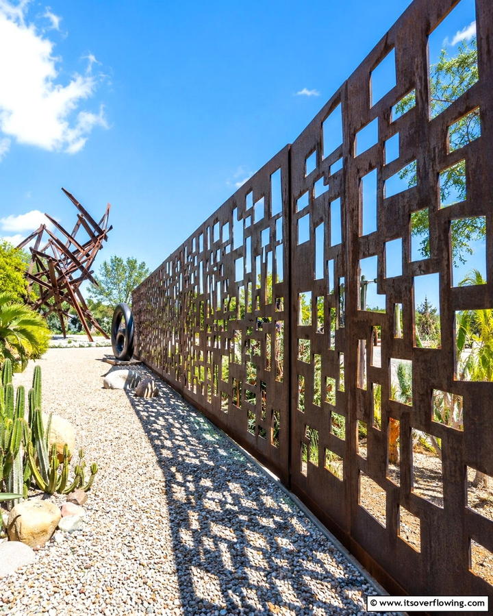 Artistic Mosaic Steel Fence - 30 Decorative Fence Ideas to Enhance Your Yard’s Aesthetic