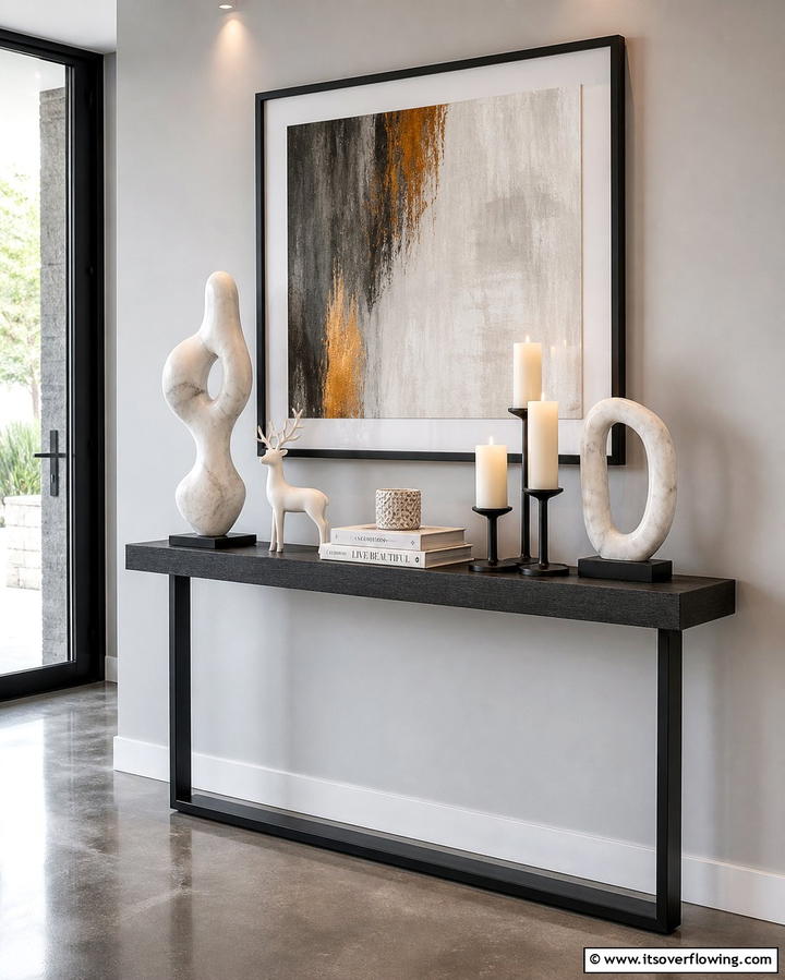 Artistic Sculptures or Figurines - 25 Entryway Table Decor Ideas to Welcome Guests in Style