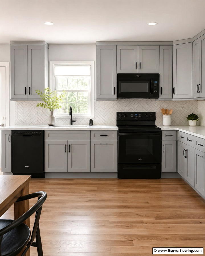 Balanced Elegance with Grey Cabinets - 25 Kitchen With Black Appliances for a Sleek and Modern Look