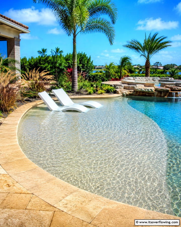 Beach Entry for a Gradual Slope - 25 Lagoon Pool Design Ideas for a Tropical Backyard Retreat