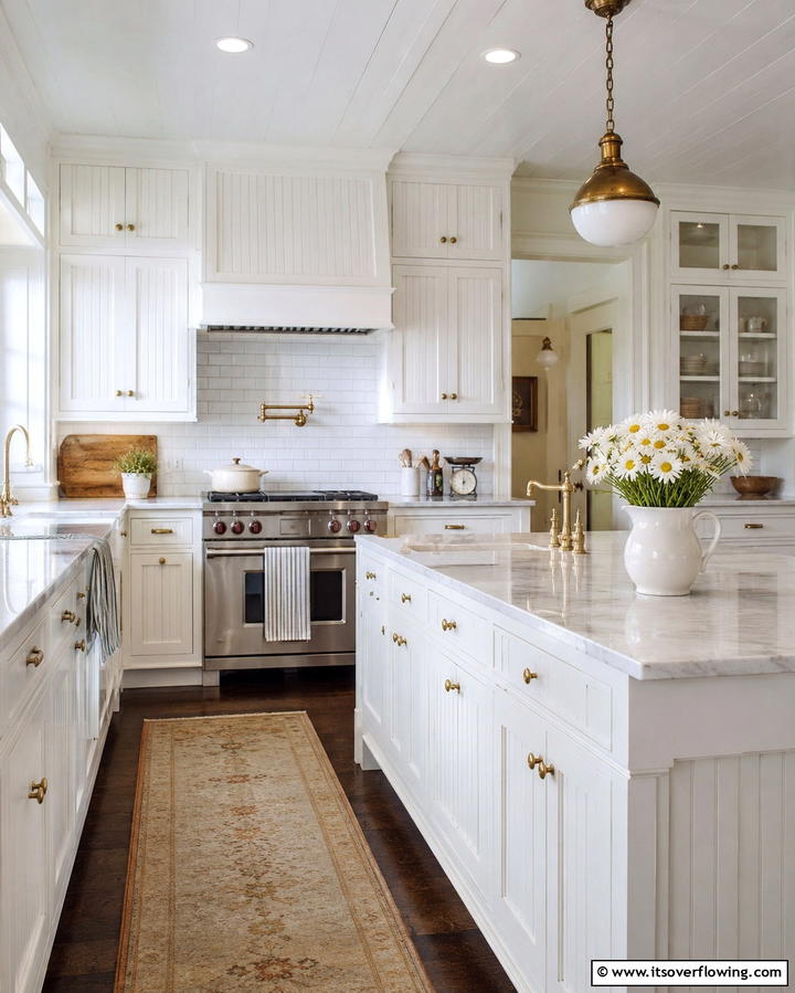 Beadboard Cabinetry - 30 Charming White Farmhouse Kitchen Inspirations