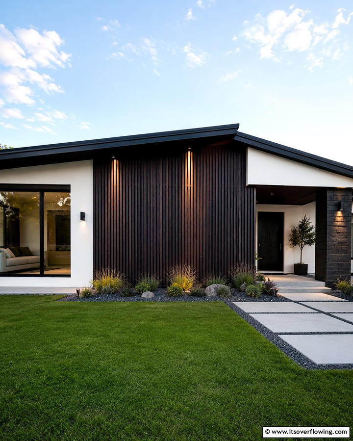 Black Accent Wall for a Bold Exterior Statement - 30 Single-Story White House Black Trim Exterior Inspirations