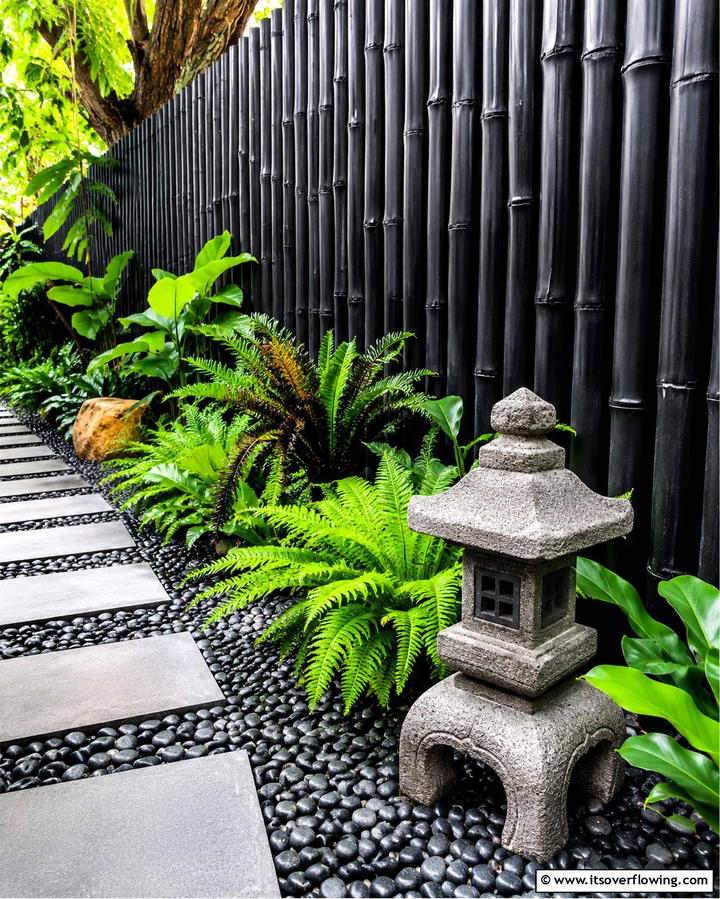Black Bamboo Fence - 25 Black Fence Ideas for Modern Outdoor Spaces