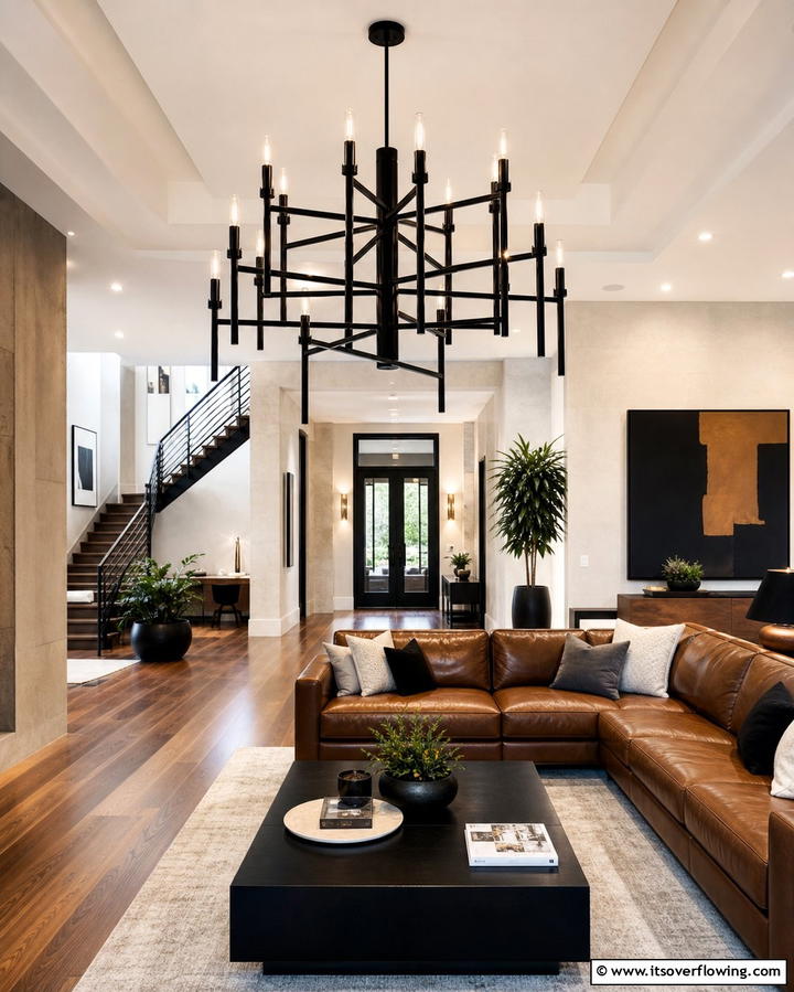 Black Chandeliers for Dramatic Lighting - 25 Chic Black and Brown Living Room Ideas for Modern Homes