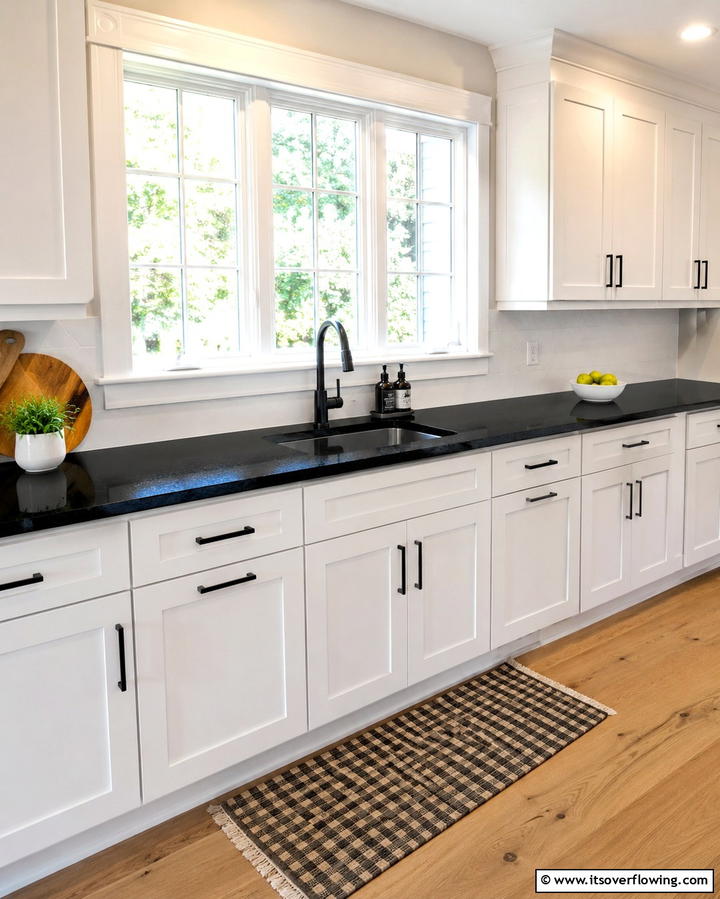 Black Countertops for Practical Elegance - 30 Stylish Black Laundry Room Ideas for a Modern Utility Space