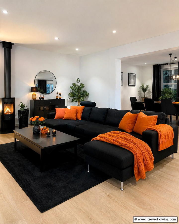 Black Furniture with Orange Throws - 25 Black and Orange Living Room Ideas for a Bold Statement