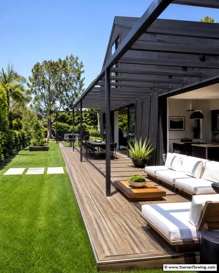 Black House with Outdoor Living Space - 25 Modern Black Houses for a Bold Statement