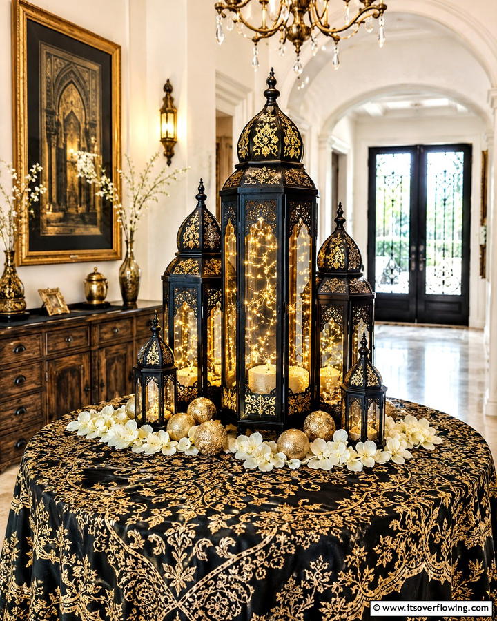 Black Lanterns with Gold Detailing - 25 Stunning Black and Gold Centerpiece Ideas for Your Home