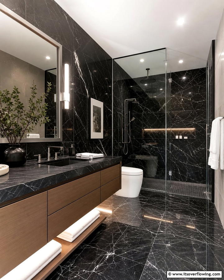 Black Marble Accents - 20 Modern Brown and Black Bathroom Ideas for a Bold Design
