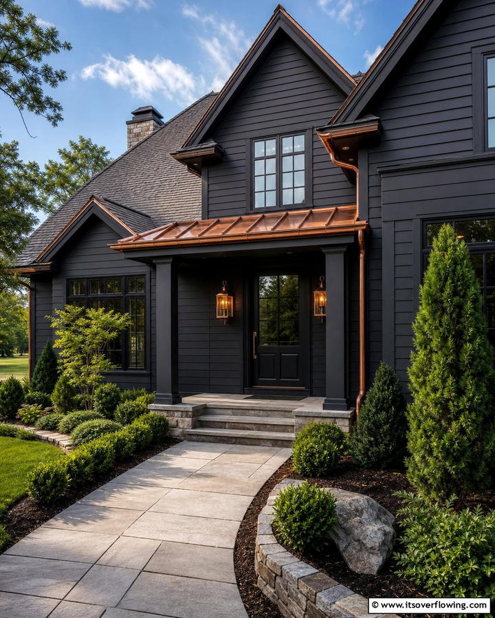 Black Siding with Copper Accents - 25 Black Siding House Ideas for a Bold and Modern Look