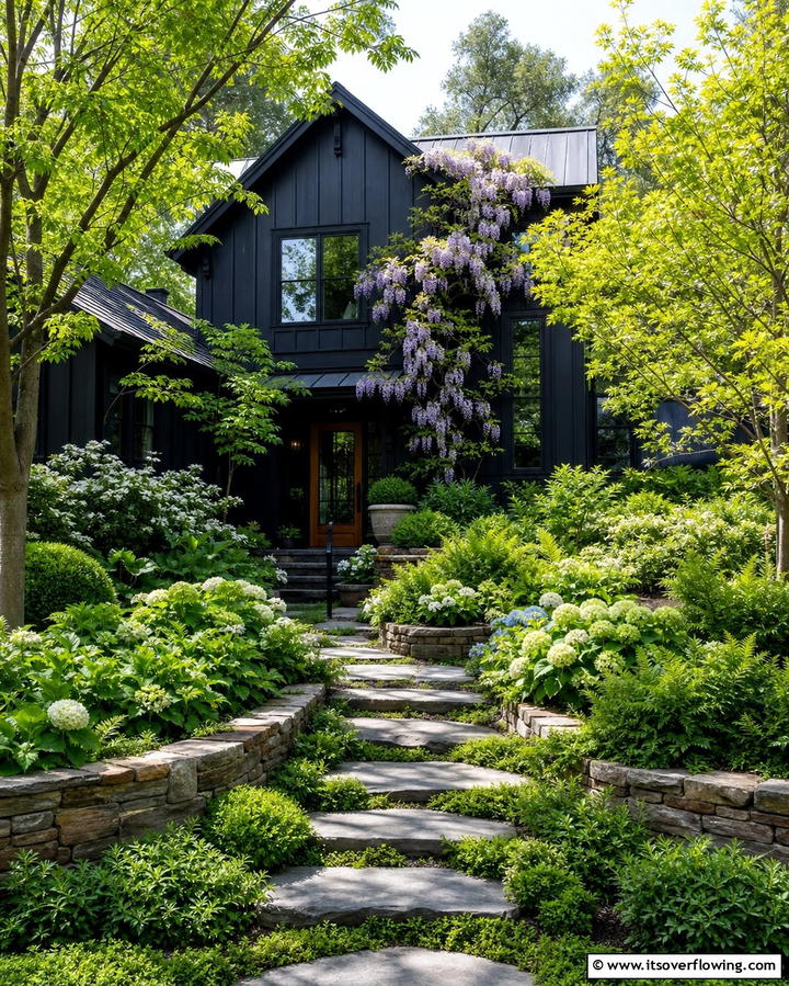 Black Siding with Greenery and LandscapingOne - 25 Black Siding House Ideas for a Bold and Modern Look