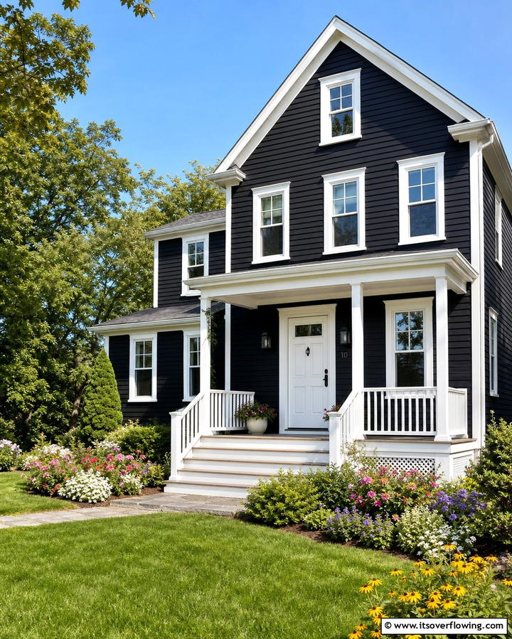 Black Siding with White Trim for Contrast - 25 Black Siding House Ideas for a Bold and Modern Look