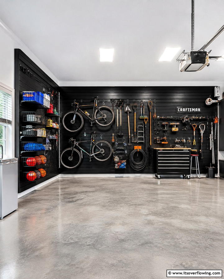 Black Slatwall Storage Systems - 25 Black Garage Ideas for a Sleek and Functional Space
