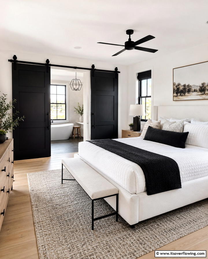 Black Sliding Barn Doors - 25 Black and White Bedroom Ideas for a Timeless Design