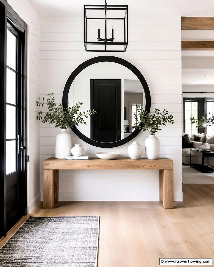 Black and White Statement Mirror - 30 Chic Black and White Hallway Ideas for Timeless Elegance