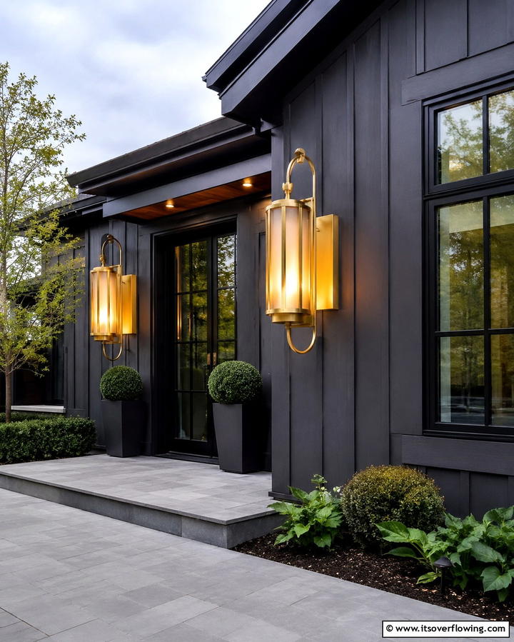 Black with Bold Lighting Fixtures - 25 Modern Black Houses for a Bold Statement