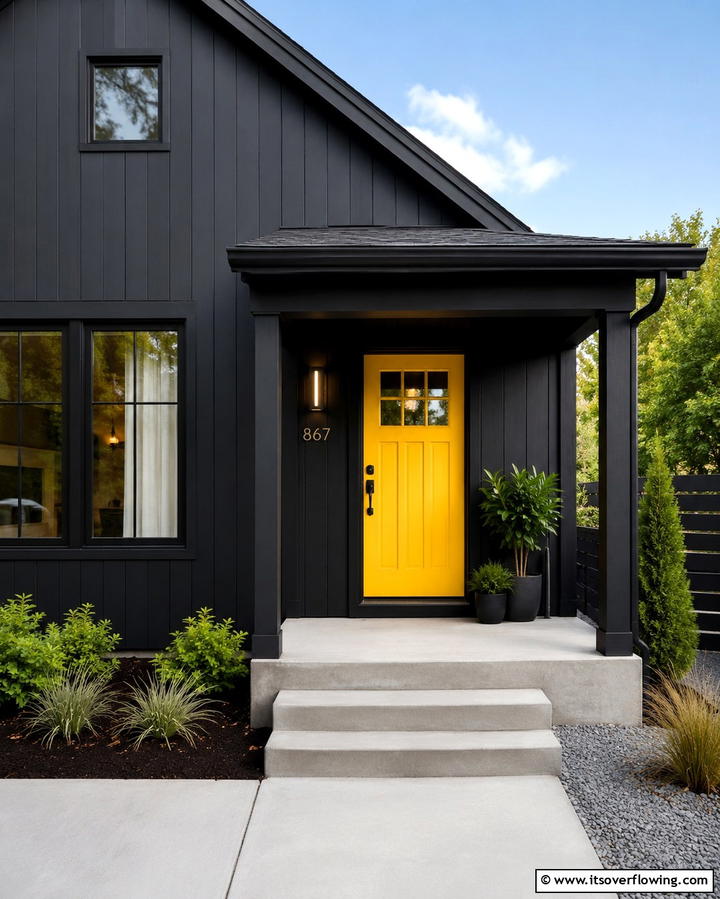 Black with Colorful Door - 25 Modern Black Houses for a Bold Statement
