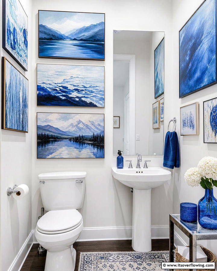 Blue Artwork Display - 20 Blue Powder Room Ideas- Small Space, Big Style