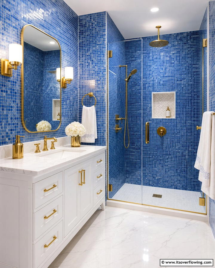 Blue Mosaic Tiles with Gold Fixtures - 25 Blue and Gold Bathroom Ideas for a Luxurious Retreat