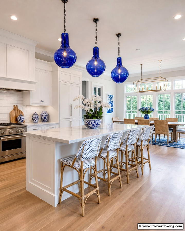 Blue Pendant Lighting for a Bold Accent - 25 Blue and White Kitchen Ideas for a Fresh and Timeless Look