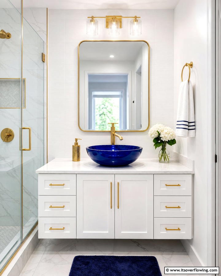 Blue Vanity Sink with Gold Faucet - 25 Blue and Gold Bathroom Ideas for a Luxurious Retreat