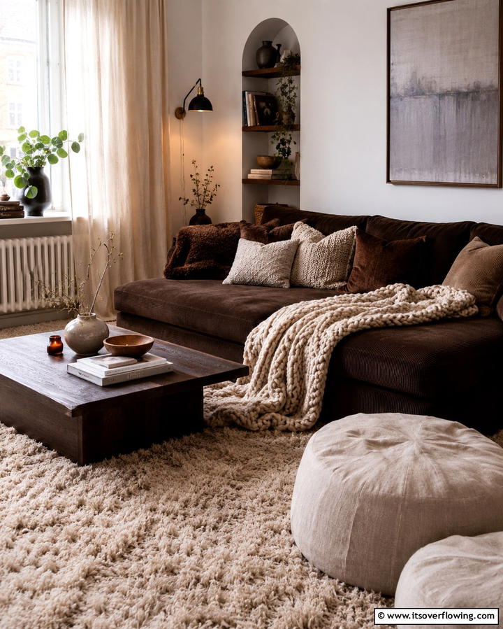 Bohemian Flair with Patterned Cushions - 30 Warm Dark Brown Couch Styling Ideas for Cozy Living Rooms