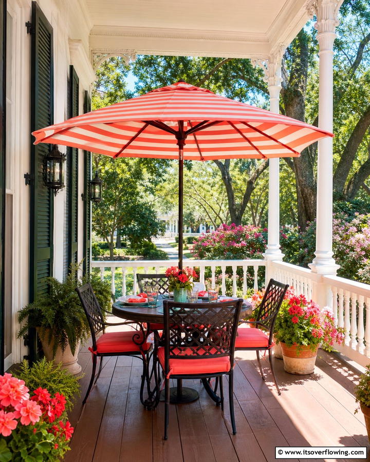 Bold Colorful Porch Umbrella - 30 Southern Front Porch Ideas for Welcoming Outdoor Spaces