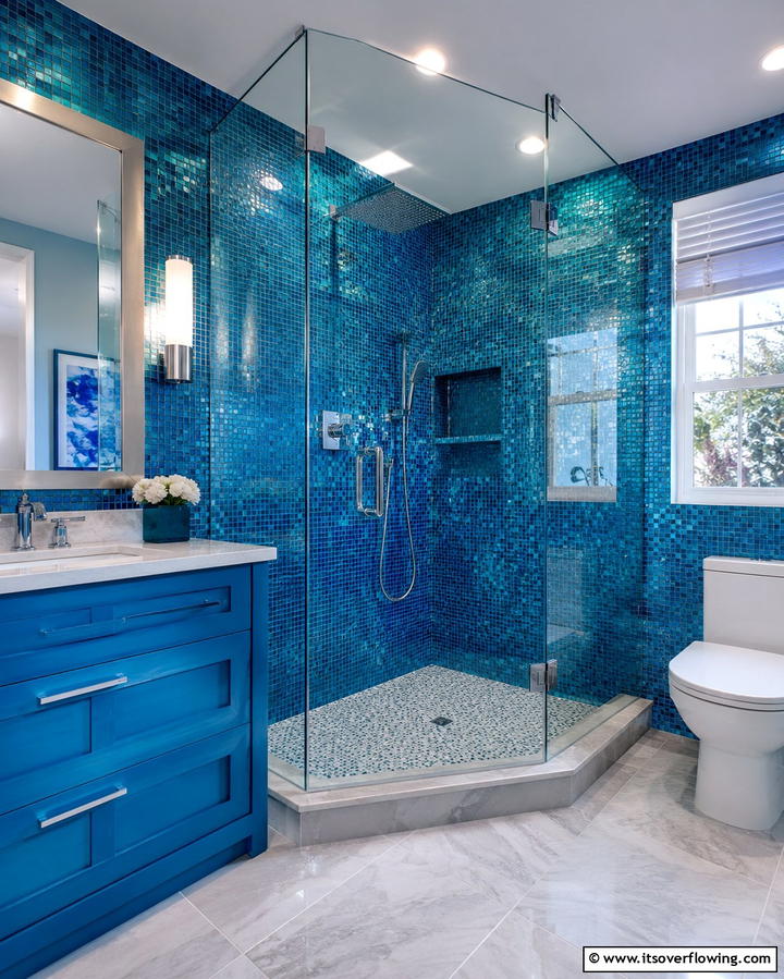 Bold Mosaic Tile Corner Shower - 30 Space-Efficient Corner Shower Ideas for Modern Bathrooms