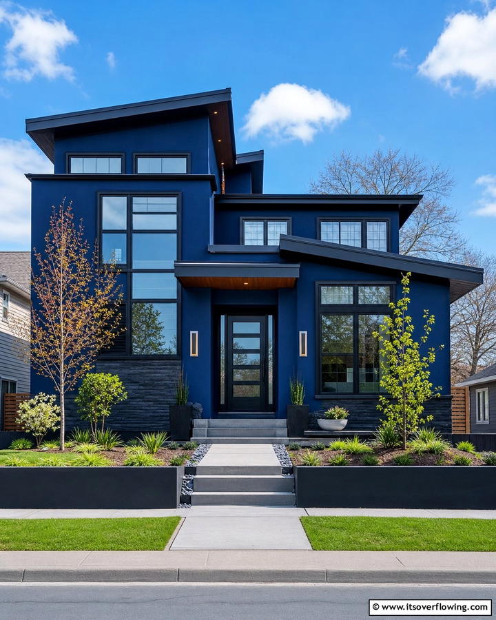 Bold and Modern Curb Appeal - 25 Blue House With Black Trim Ideas for a Striking Exterior