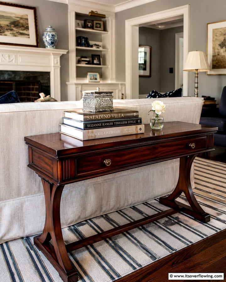 Books with Personal Touches - 25 Sofa Table Decor Ideas to Elevate Your Space