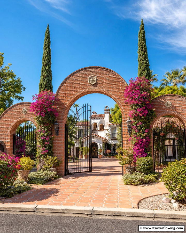 Brick Fence with Arched Gateways - 20 Front Yard Brick Fence Ideas for a Classic Look